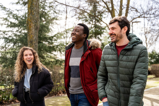 Group of friends having fun outdoors in winter