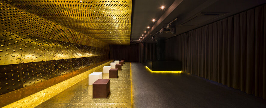 Luxury nightclub interior with golden accents