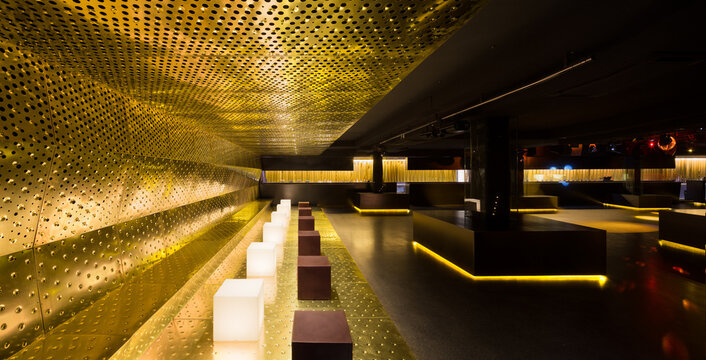 Luxurious nightclub interior with golden decor