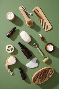 Natural zero waste cosmetics on green background