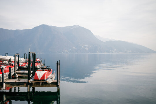 Scenic lake view with docked pedal boats