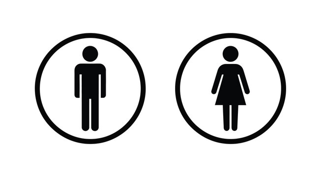 Male and female restroom signs in circles black silhouette