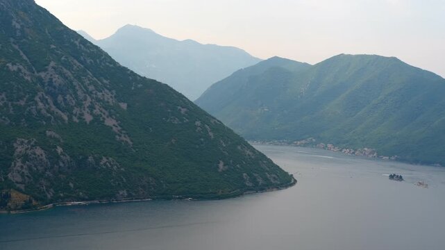 Scenic aerial view of kotor bay and perast islands in montenegro. Stunning aerial panorama revealing the picturesque town of perast and the iconic islets of our lady of the rocks in the bay of kotor