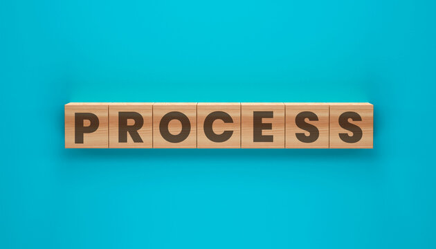 Process of Strategy: Wooden blocks spell out the word PROCESS, laid out against a vivid blue backdrop, creating a visual representation of progress, procedures.