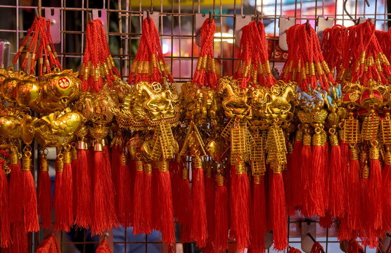 Closeup Chinese tassel on marketplace a accessories for hang on doors or windows for Chinese New Year, the Year of the Horse, to bring good fortune and longevity