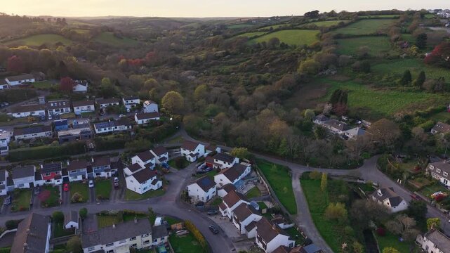 Aerial drone footage of Coosebean Woodland in Truro, Cornwall, showcasing dense trees, lush greenery, and peaceful natural surroundings