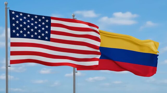 United States and Colombia Flags Waving Together Symoblizing International Relations and
