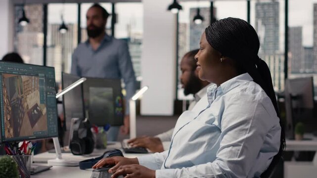 Interior designer, architectural software, remodeling layout on computer, with virtual assets for new apartment development. Black woman working at creative agency with 3D rendering.