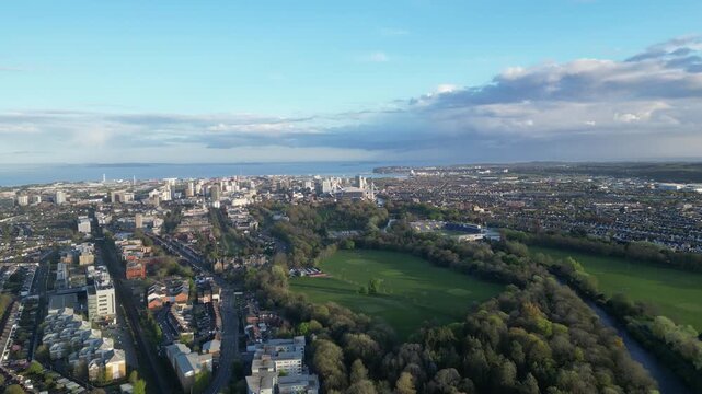 4K Aerial Shot Flying Toward Cardiff Centre Along Blackweir Park and Bute Park