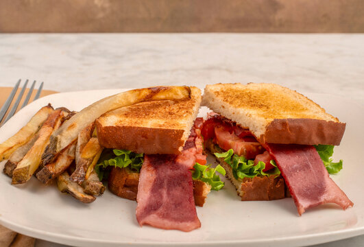 blt sandwich  served with  home made french fries