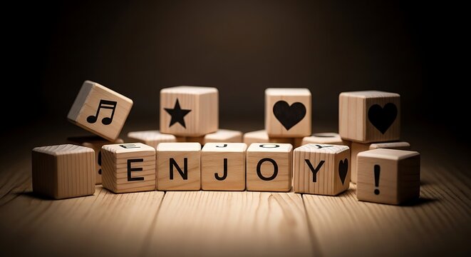 Wooden blocks spelling enjoy with symbols against a dark background