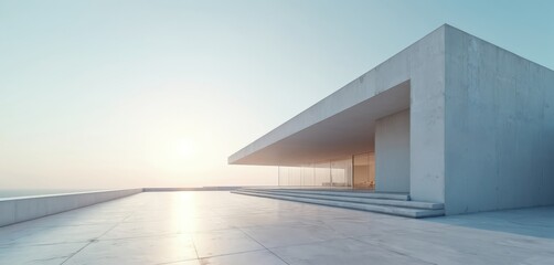 Obraz premium Minimalist white building with glass walls. Large concrete terrace faces calm ocean under clear sky. Modern house exterior offers spacious, open floor plan and serene view.