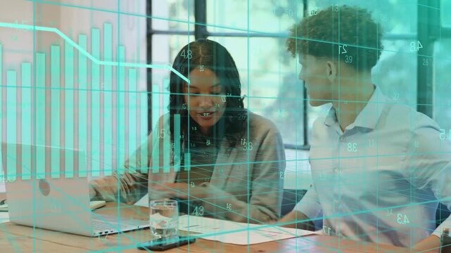 Woman typing on laptop after man pointing at paper, teal charts overlay guiding business consensus