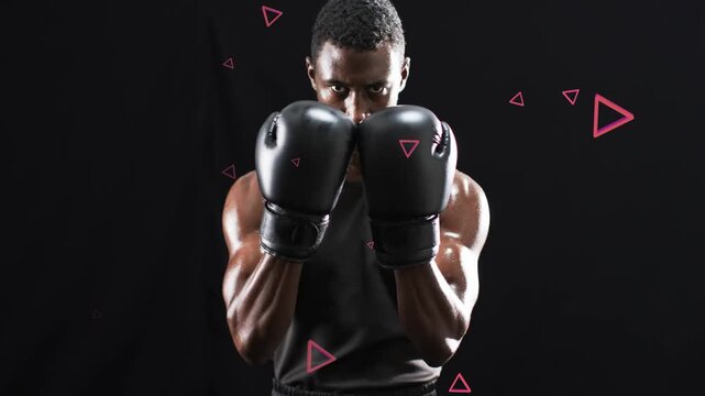 Boxer gloves up lifting head showing gaze while pink triangles drifting around showing sports focus