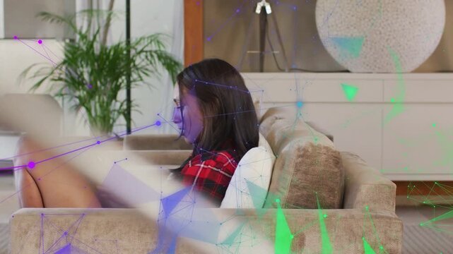 Woman sitting on sofa tapping phone while animated overlays shifting to reveal technology message