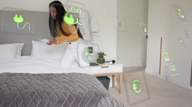 Woman with papers entering, climbing onto bed reading for energy, green icons floating across frame