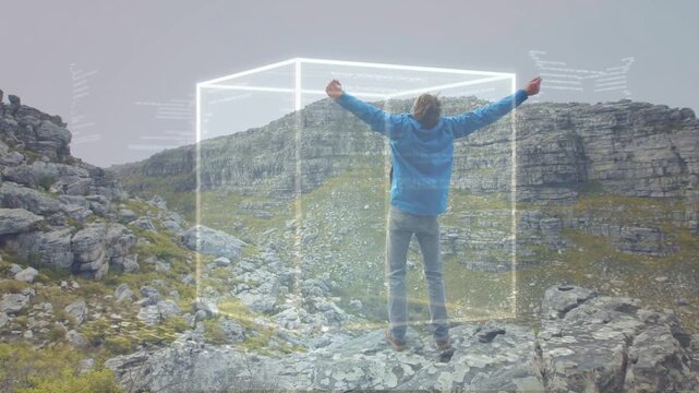 Male hiker stepping onto rock ledge and causing wireframe cube, HUD aligning for technology mapping
