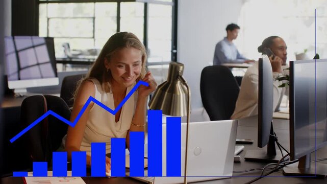 Analyst clicking mouse watching rising blue data chart on laptop reviewing results coworker smiling