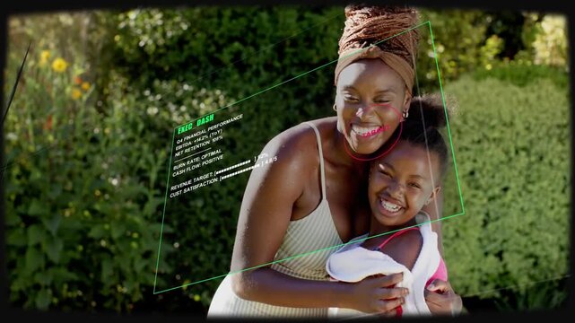 Woman adjusting towel and pulling child closer, hugging, posing for cam as tech HUD tracking faces