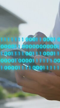 Vertical video: Man tapping phone screen, animating blue binary rows across hands for tech demo