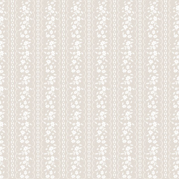 An elegant seamless pattern featuring delicate floral lace motifs arranged in vertical stripes on a soft beige background. This design reflects a vintage and shabby chic aesthetic with a subtle, femin
