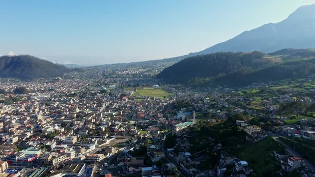 Otavalo, Ecuador: 5-1-2023: aerial view showing the outer neighbourhoods of the city