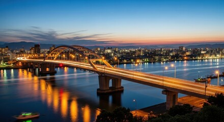 Naklejka premium Cityscape with Illuminated Bridge at Dusk