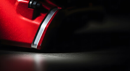 Naklejka premium Close-up of Red High Performance Brake Caliper on Sport Car