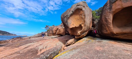 Large boulders and rocks on the shore of the sea © HDC Creative