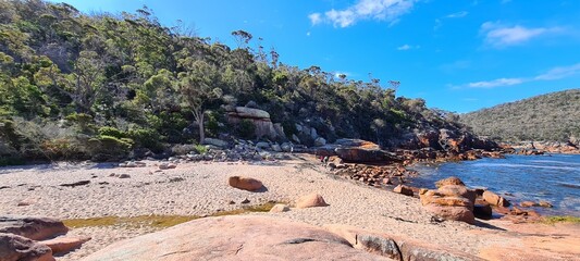 Large boulders and rocks on the shore of the sea © HDC Creative