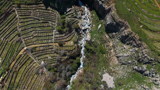 Drone video showing a waterfall in Faraya with rocks, greenery and natural outdoor setting