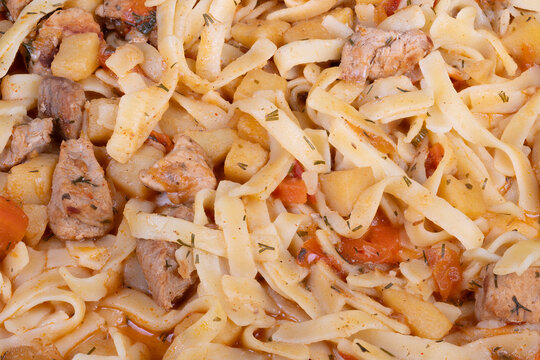 Homemade lagman for busy evenings. Easy reheatable noodle dish with meat and vegetables. Simple weeknight lagman recipe with savory ingredients suitable for meal preparation