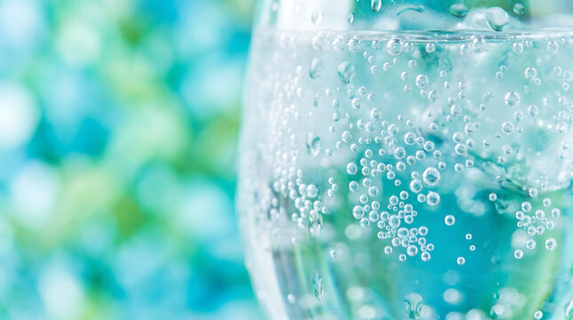Fresh cold soda water with carbonated bubbles