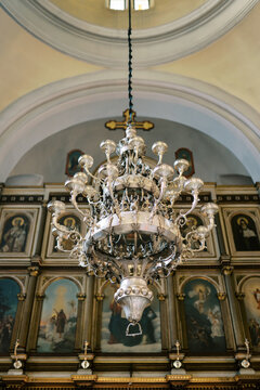 Extravagant lighting piece emphasizing craftsmanship and reverence within sacred space