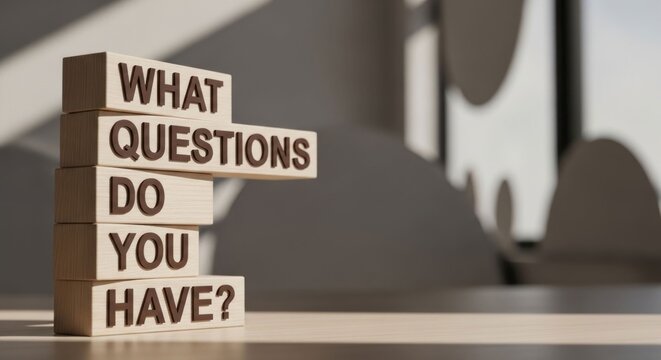 What Questions Do You Have Wooden Blocks Stacked on Table.