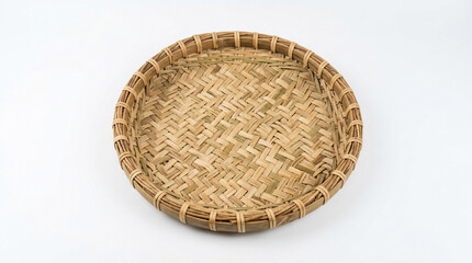 Fototapeta premium Woven bamboo plate on white background.