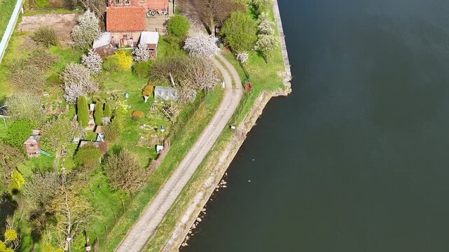 Aerial Bydgoszcz Poland Brda River house kayak race 1. Northern Poland. River Brda inland waterway, tributary Vistula. Kayak course, race, competition and recreation. Boating athlete and exercise.