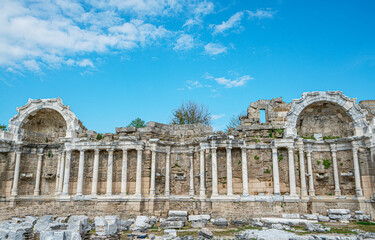 Fototapeta premium The scenic views of the nympheum, originally natural grottoes, which tradition assigned as habitations to the local nymphs in Side, Turkey.