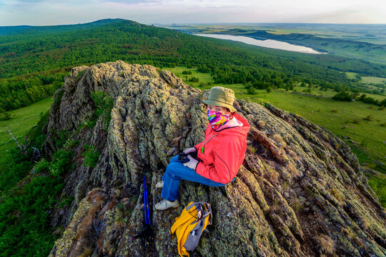 beautiful mature women travels through the mountains of the Southern Urals