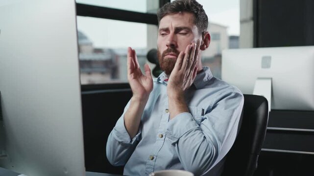 A contemplative man is resting by the window, immersed in thought, within an urban environment