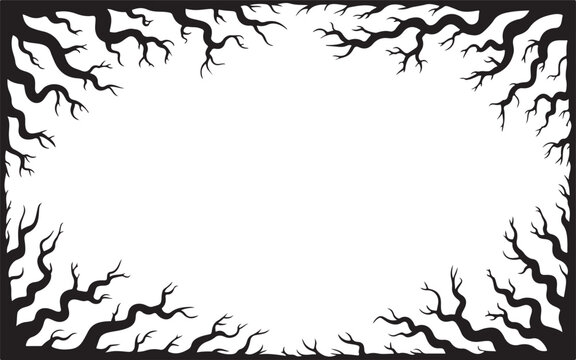 A dark frame formed by eerie bare tree branches with a spooky Halloween atmosphere