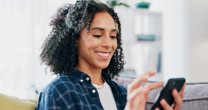 Laugh, texting and woman on couch with phone, online communication and comic post on social media. Happy, digital and female person in house with tech, funny message or meme reaction on chat app.