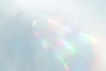 Fotobehang Abstract 淡いブルーに虹色が揺らめくホログラム光の抽象背景素材  © Eru