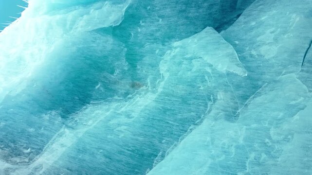 Close-up view of icy blue textures on Morteratsch Glacier surface