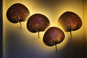 Fototapeta premium wicker fans in a room in siem reap in cambodia 