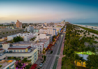 Fototapeta premium Miami Beach city night aerial view on Ocean Drive. Miami city with Ocean Drive night panorama. Miami shoreline on Ocean Drive. Aerial view of Miami with Ocean Drive at night.