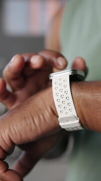 Exercise, hands and smart watch with man in gym for performance, progress on tracking app. Timer, fitness and digital tech with athlete person in health club for training, wellness or routine