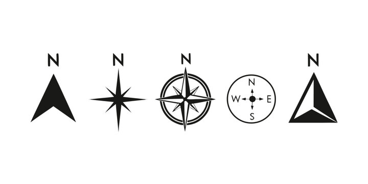 Four different compass rose illustrations with north indicators