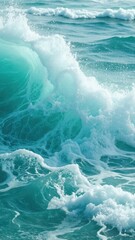 Fototapeta premium Vibrant blue ocean waves in motion, with white foam, under a clear sky.