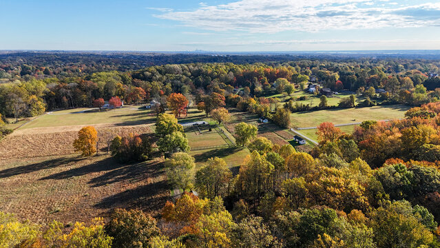 Aerial view of rural farmland and autumn landscape in Garnet Valley, suburb of Philadelphia, Pennsylvania USA
